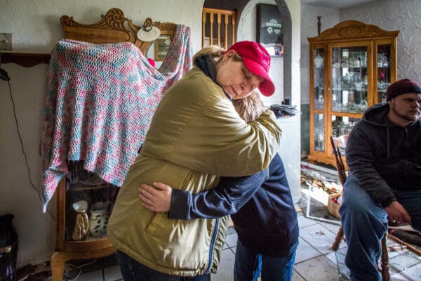 Lisa Johnston | lisajohnston@archstl.org | Twitter: @aeternusphoto

A devastating tornado hit the Perryville Missouri area on February 28 left one young man dead  as it roared across Perry County and tore a 15-mile-long path of destruction costing 60 families their homes and businesses. Many parishioners from St. Vincent De Paul in Perryville were affected.  The Catholic community rallied quickly to help them. Mary Fulton was able to pray one Our Father but did not quite finish one Hail Mary, as the tornado tore through her home. The roof was lifted and and came down askew on its foundations but he family business was destroyed.  She got a hug from her nephew, Vincent Shaw, in the decimated kitchen of her home.