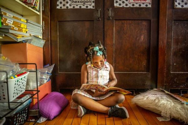 Kindergarten student Niyah Thomas read during quiet time at St. Ann School in Normandy, MO on Tuesday, Sep. 10, 2019.  

Lisa Johnston | lisajohnston@archstl.org  | Twitter: @aeternusphoto