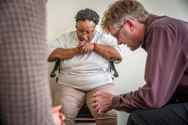 Young adult members of the Society of St. Vincent de Paul from St. Vincent de Paul Parish, Holly Scheibel and  Bryan Kirchoff, prayed with Cheryl Boyd at her apartment in St. Louis, Missouri on Sunday, Feb 09, 2020.

Lisa Johnston | lisajohnston@archstl.org  | Twitter: @aeternusphoto