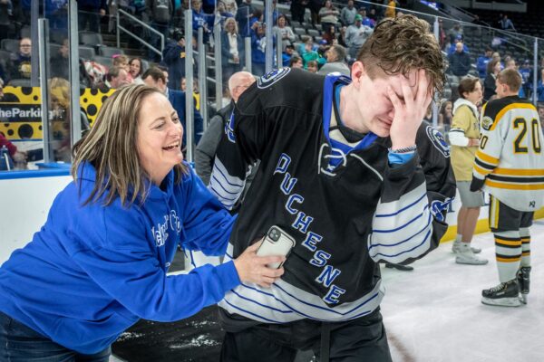 Michell Begley finished embracing her son Trevor Begley who was emotional after scoring three goals to lead his team to victory. Duchesne High School beat rival Oakville to win the Wickenheiser Cup during the Midstates Championships at Enterprise Center in St Louis, Missouri on Wednesday, Mar 11, 2020.

Lisa Johnston | lisajohnston@archstl.org  | Twitter: @aeternusphoto