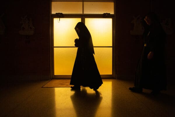 The Passionist nuns daily routine has not changed during the COVID-19 pandemic. A nun walked to the choir at the Passionist Monastery in Ellisville, Missouri on Monday, Mar 23, 2020. 

Lisa Johnston | lisajohnston@archstl.org  | Twitter: @aeternusphoto