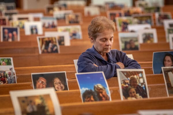 Teresa Paiva prayed while parishioners virtually sat around her in pictoral form in the pews at Holy Spirit Parish in Maryland Heights, Missouri on Thursday, April 30, 2020.  

Lisa Johnston | lisajohnston@archstl.org  | Twitter: @aeternusphoto