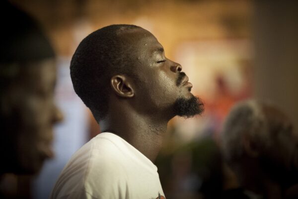 Lisa Johnston | lisajohnston@archstl.org Anton Safi Smith prayed during morning Mass at St. Augustine Parish.